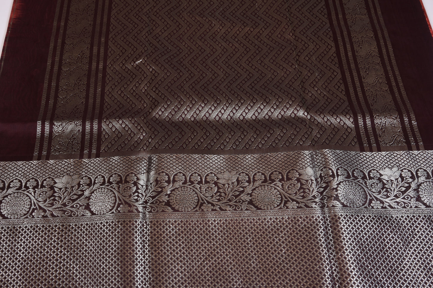 Classy dark brown silk saree with silver zari