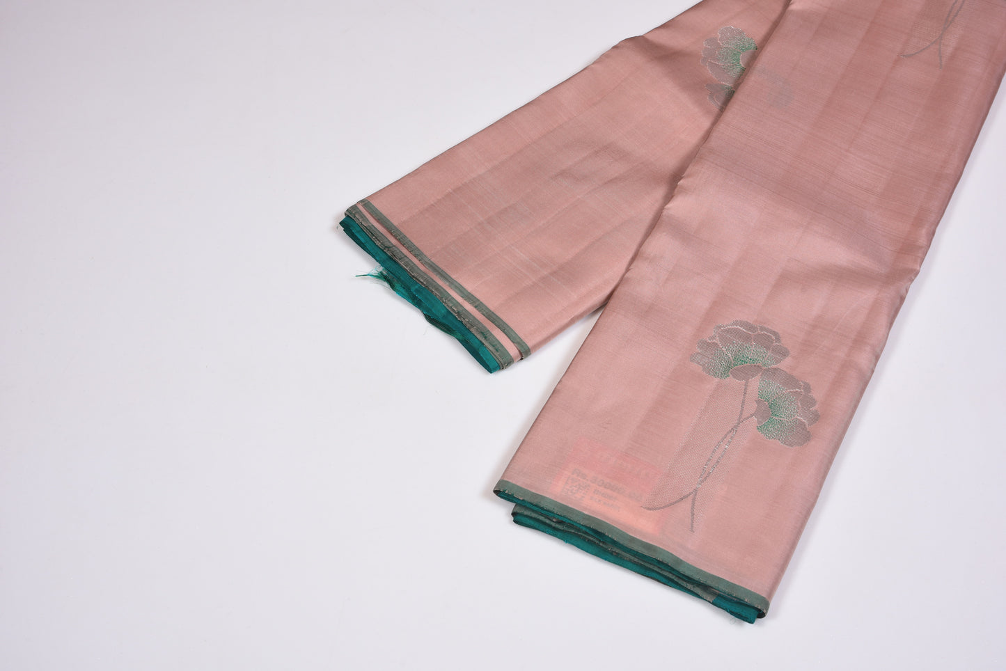 Borderless peach colour saree with all over paired flowers