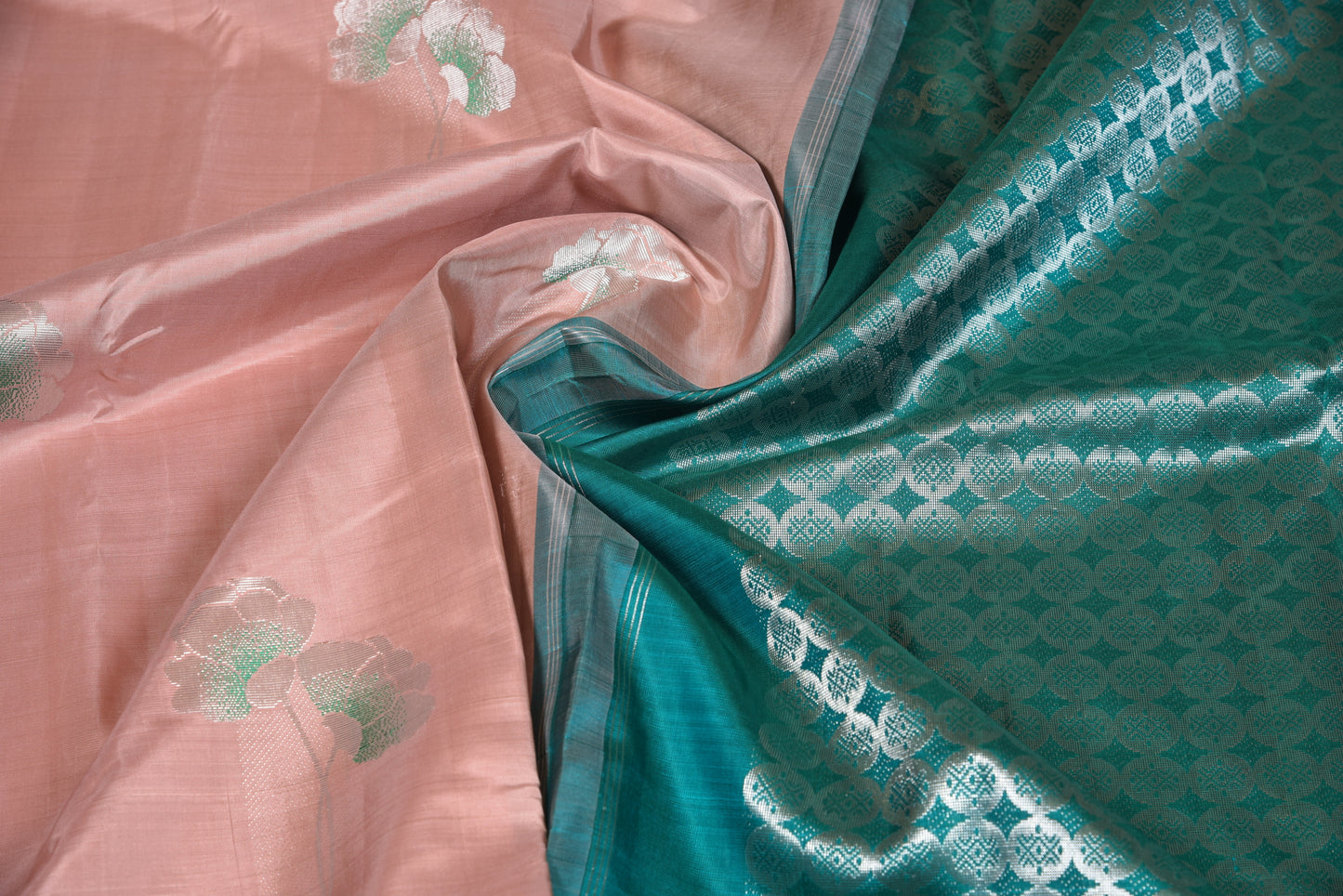 Borderless peach colour saree with all over paired flowers