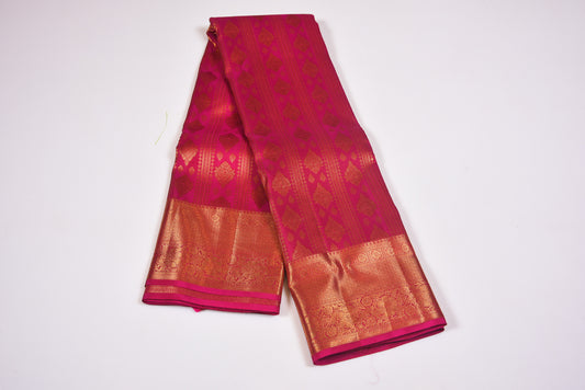 Traditional burgundy silk with golden copper zari border