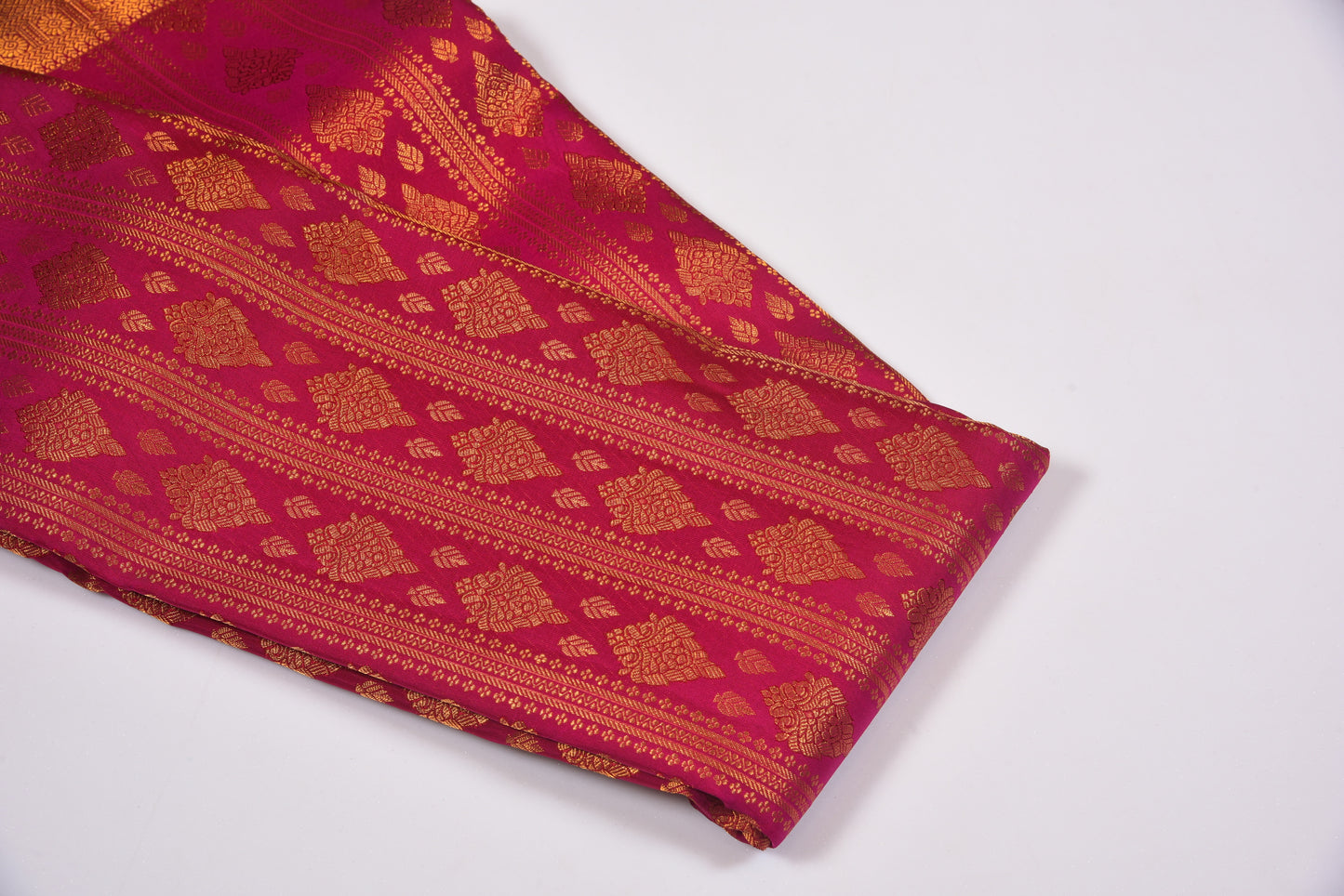 Traditional burgundy silk with golden copper zari border
